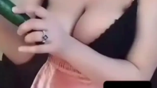 Sexy tango model Ishika aka Love reveals huge boobs licks them and cucumber fuck live